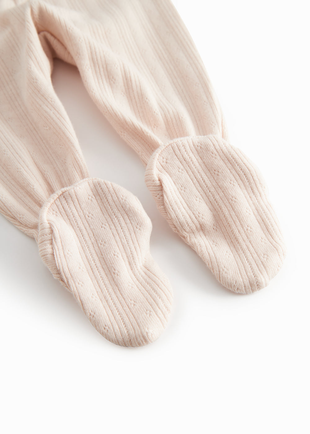 Lyserøde pointelle bukser med fødder til nyfødt baby