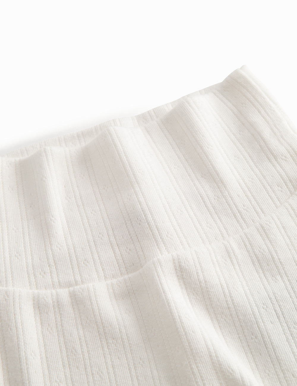 Hvide pointelle bukser til de nyfødte