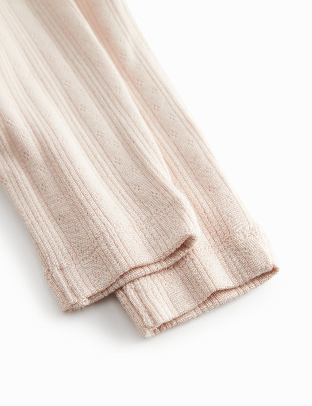 Lyserøde pointelle bukser til de nyfødte