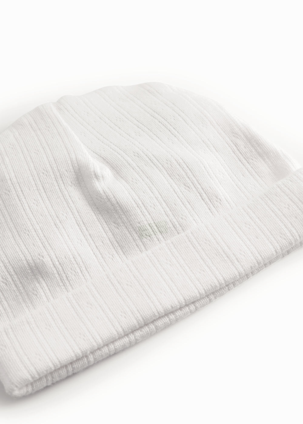 Ensfarvet hvid babyhue