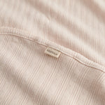 Lyserød pointelle babytæppe med rundede hjørner og picotkanter