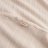 Lyserød pointelle babytæppe med rundede hjørner og picotkanter