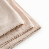 Lyserød pointelle babytæppe med rundede hjørner og picotkanter