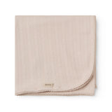 Lyserød pointelle babytæppe med rundede hjørner og picotkanter