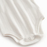 Baby bodystocking uden ærmer med stropper