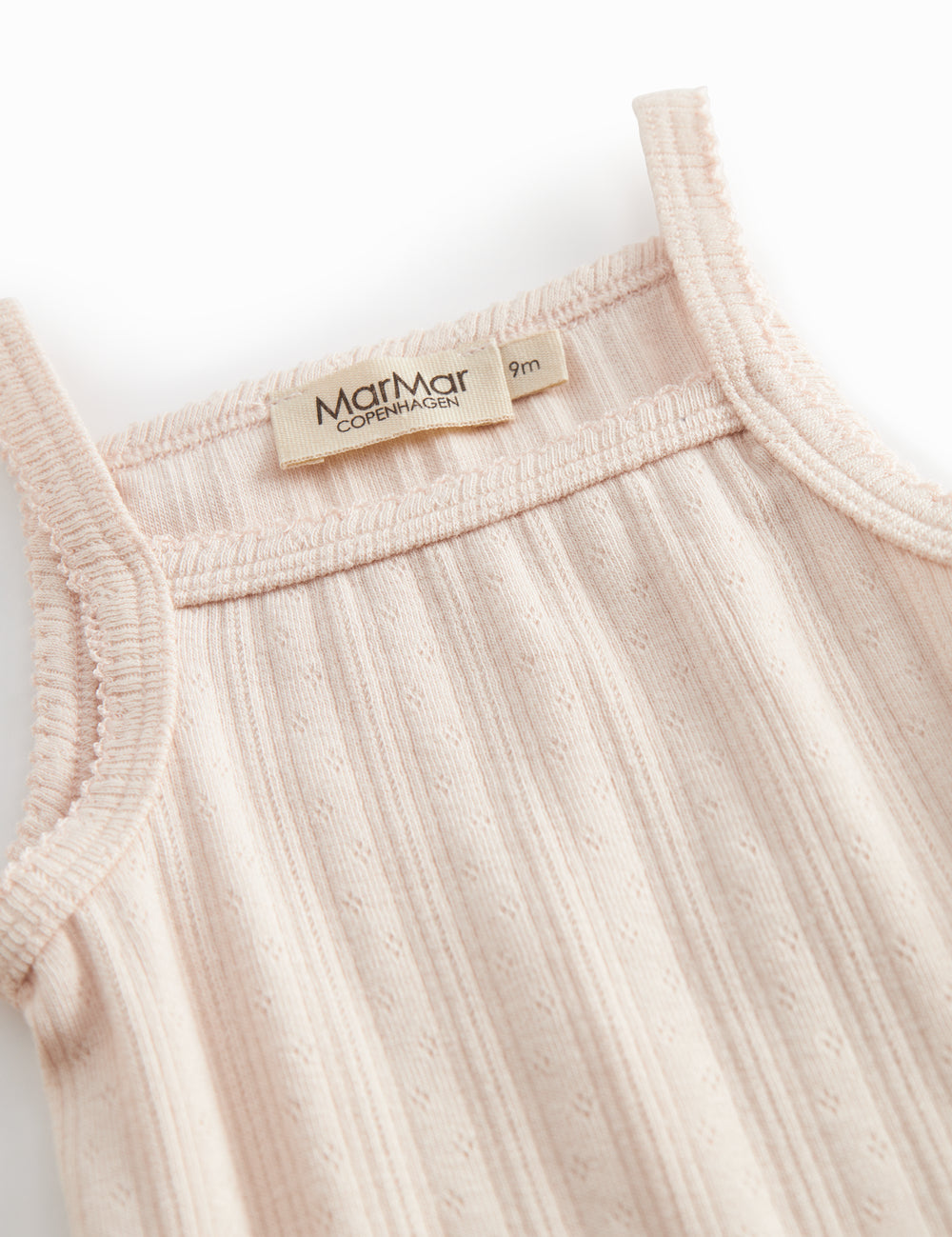 Lyserød baby bodystocking uden ærmer med stropper