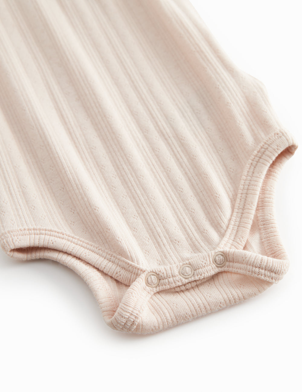 Lyserød baby bodystocking uden ærmer med stropper