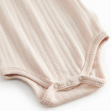 Lyserød baby bodystocking uden ærmer med stropper