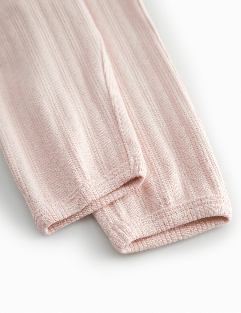 Lyserøde pointelle babybukser med elastik og  pyntebånd i livet