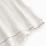 Kortærmet hvid pointelle t-shirt til børn med flæser på ærmerne