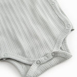 Langærmet lysegrøn pointelle bodystocking til nyfødte