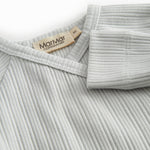 Langærmet lysegrøn pointelle bluse til nyfødte med slå-om-lukning