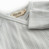 Langærmet lysegrøn pointelle bluse til nyfødte med slå-om-lukning