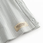 Langærmet lysegrøn pointelle bluse til nyfødte med slå-om-lukning