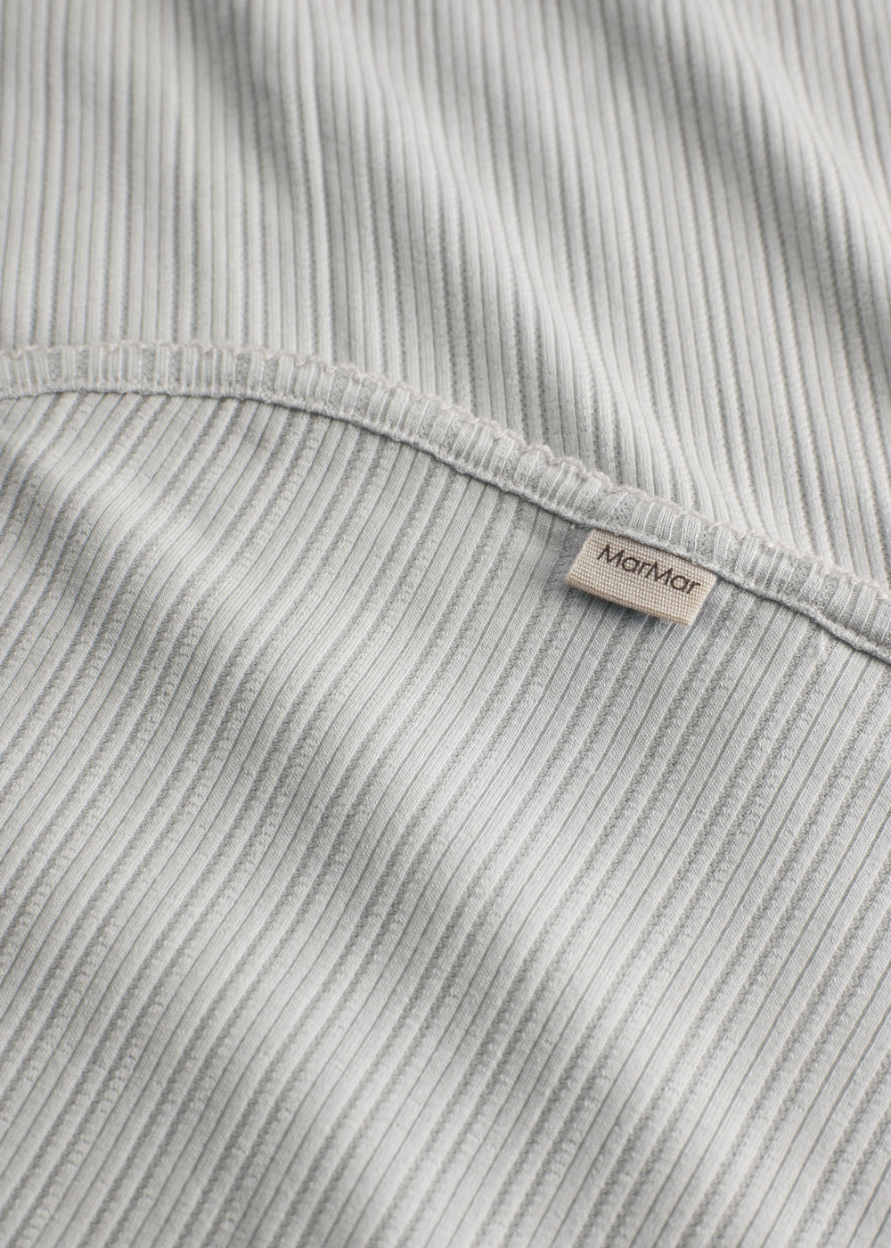 Lysegrøn pointelle babytæppe med rundede hjørner og picotkanter