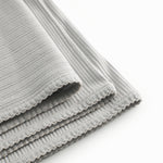 Lysegrøn pointelle babytæppe med rundede hjørner og picotkanter