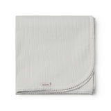 Lysegrøn pointelle babytæppe med rundede hjørner og picotkanter