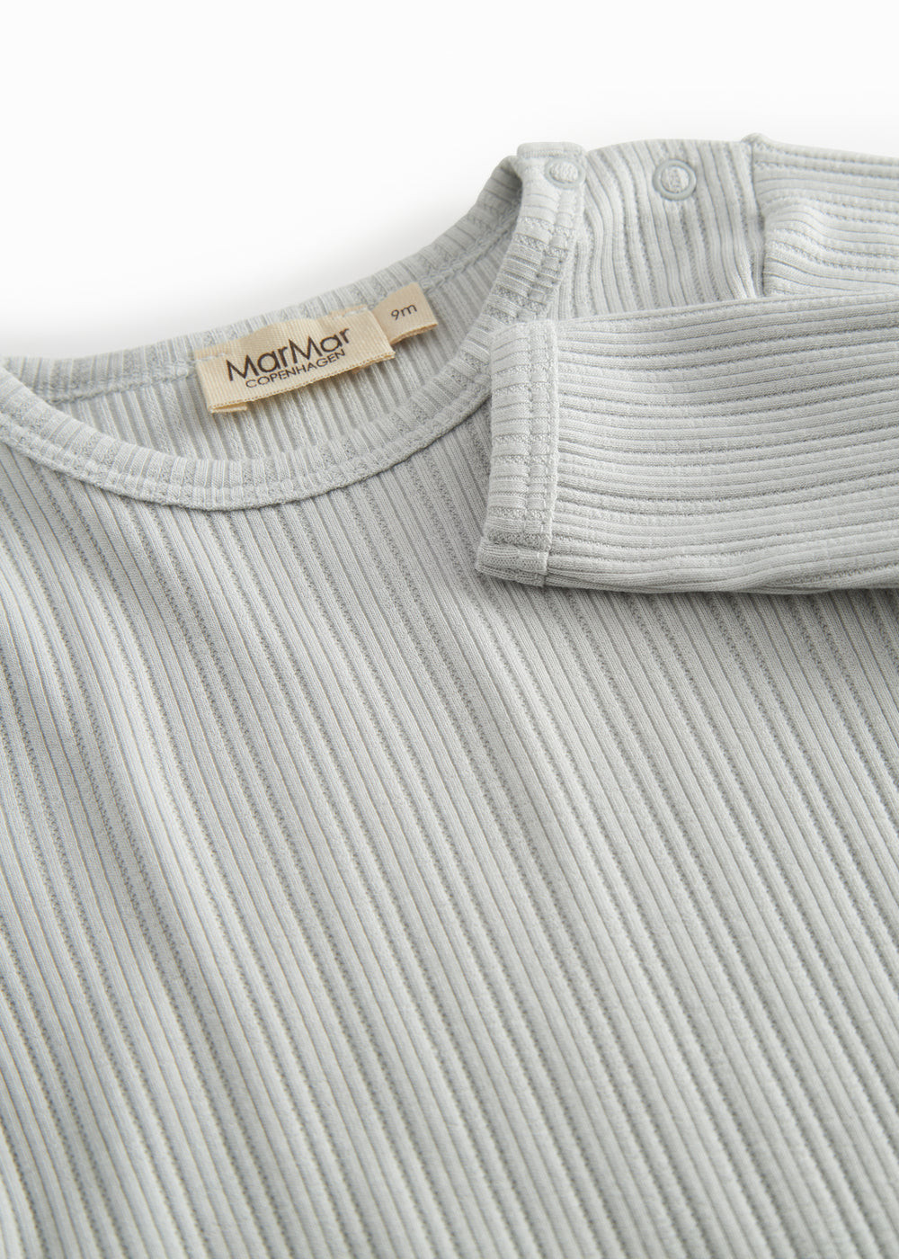 Langærmet lysegrøn pointelle baby bodystocking