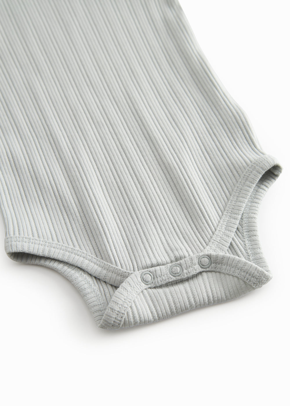 Langærmet lysegrøn pointelle baby bodystocking