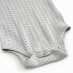 Langærmet lysegrøn pointelle baby bodystocking