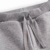 Grå sweat bukser til børn med rosa MarMar logo på lommen og bindebånd