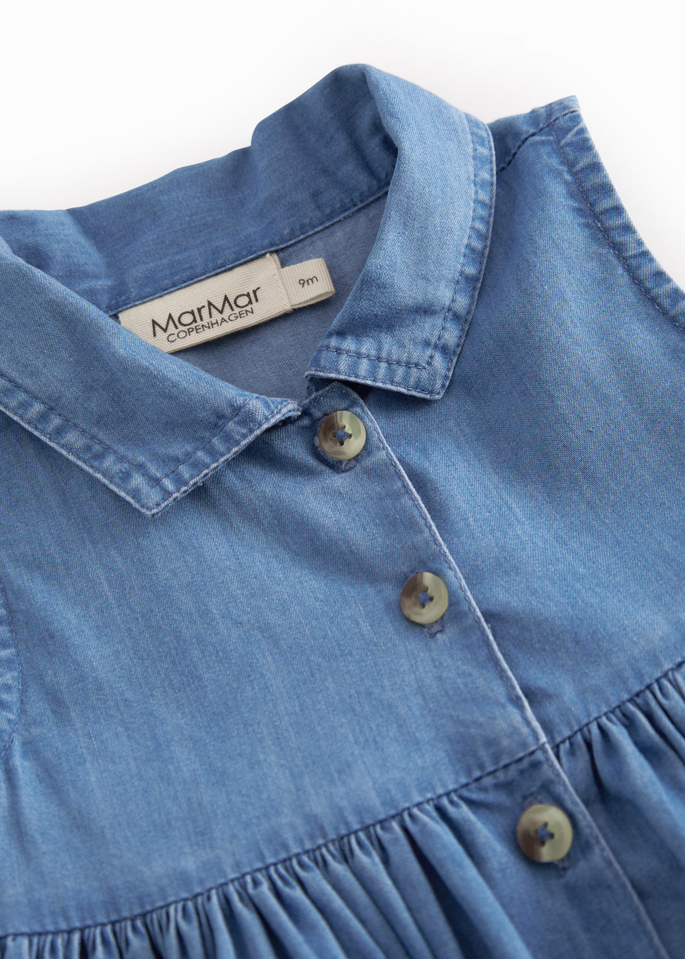 Blå baby denimkjole uden ærmer med krave, knapper og lommer