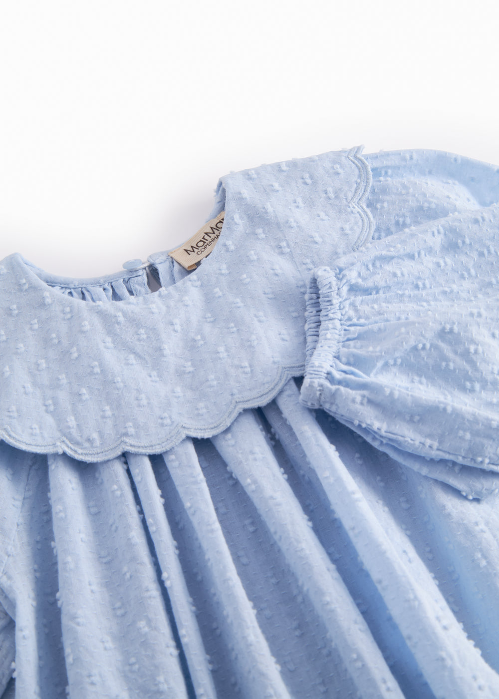 Lyseblå baby bodystocking med en fin bølget krave