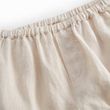 Beige shorts/bloomers til baby