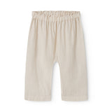Beige bukser til baby med løs pasform  og elastik i taljen 