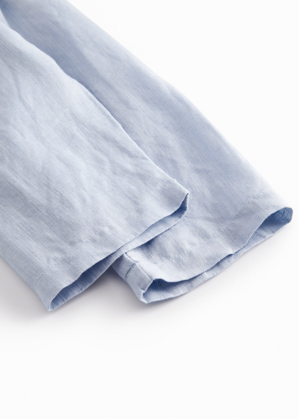 Lyseblå bukser til baby med løs pasform  og elastik i taljen 