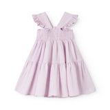 Ærmeløs lyserød kjole til børn med brede stropper og flæser på skulderen og smock bagpå