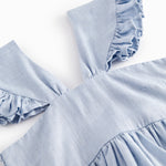 Ærmeløs kjole til børn med stropper og flæser på skulderen