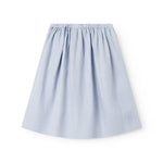 Lyseblå nederdel til børn med sidelommer og knapper