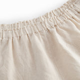 Beige shorts til børn med flæser og sidelommer