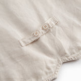 Beige vest til børn med knapper og lomme