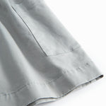 Ærmeløs blå chino kjole til børn med knapper