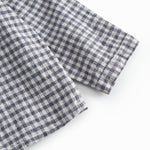 Langærmet ternet baby skjorte med kinakrave og knaplukning foran