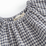 Langærmet ternet kjole til baby