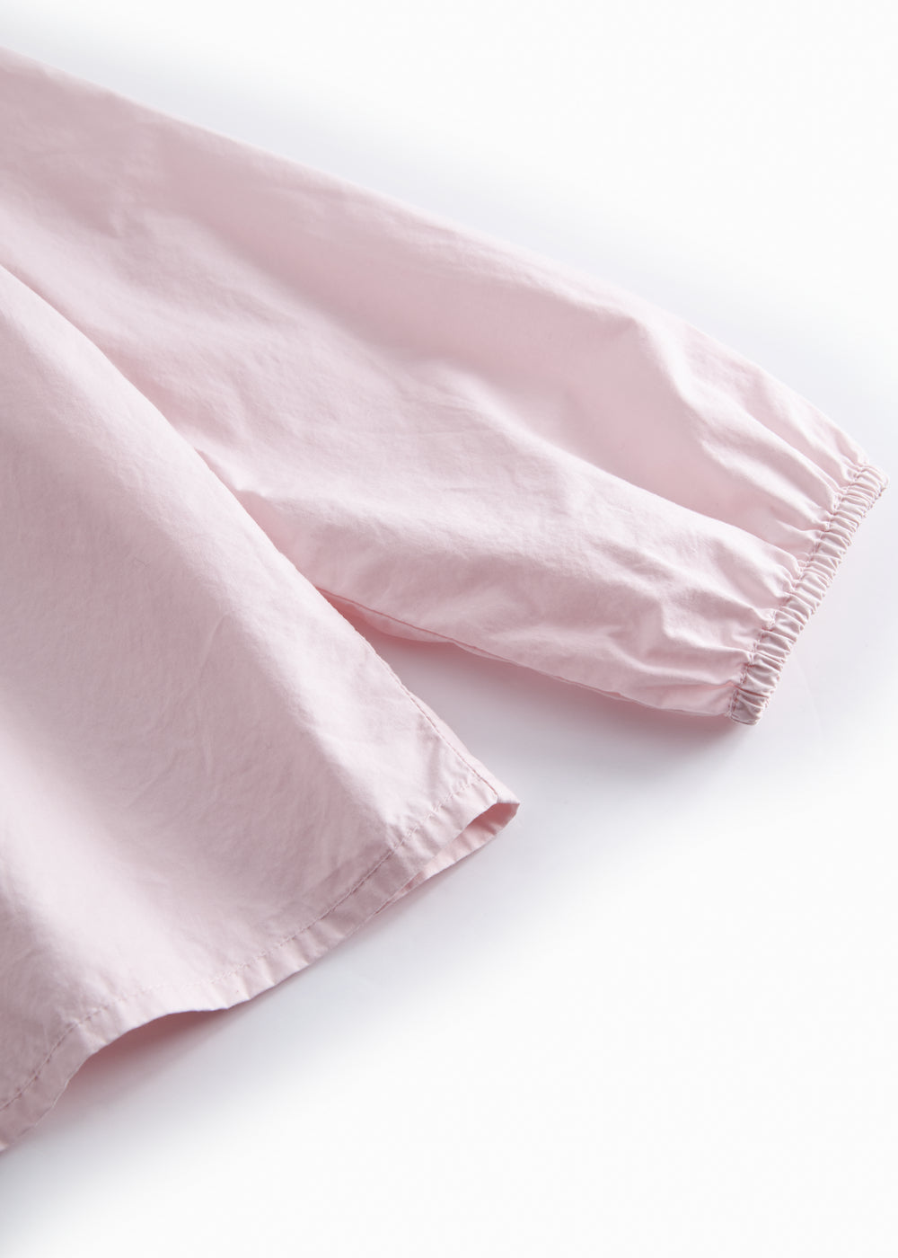 Lyserød børnebluse med krave og lange ærmer