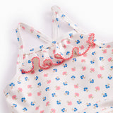 Badedragt til børn med blomster og flæser