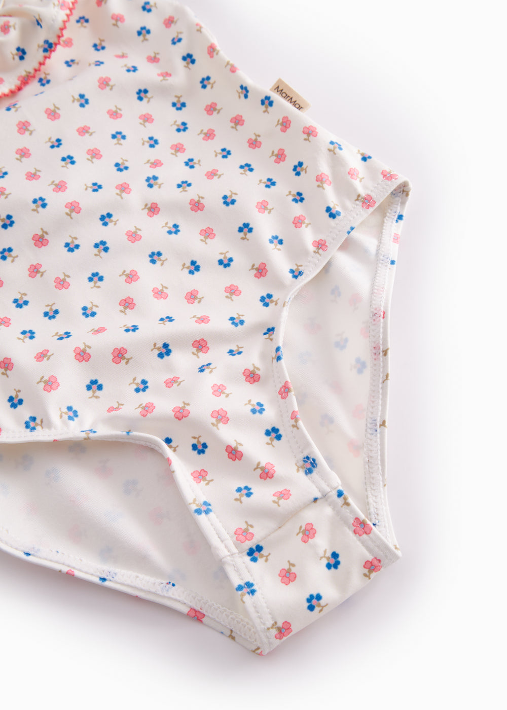 Badedragt til børn med blomstret mønster  og flæser