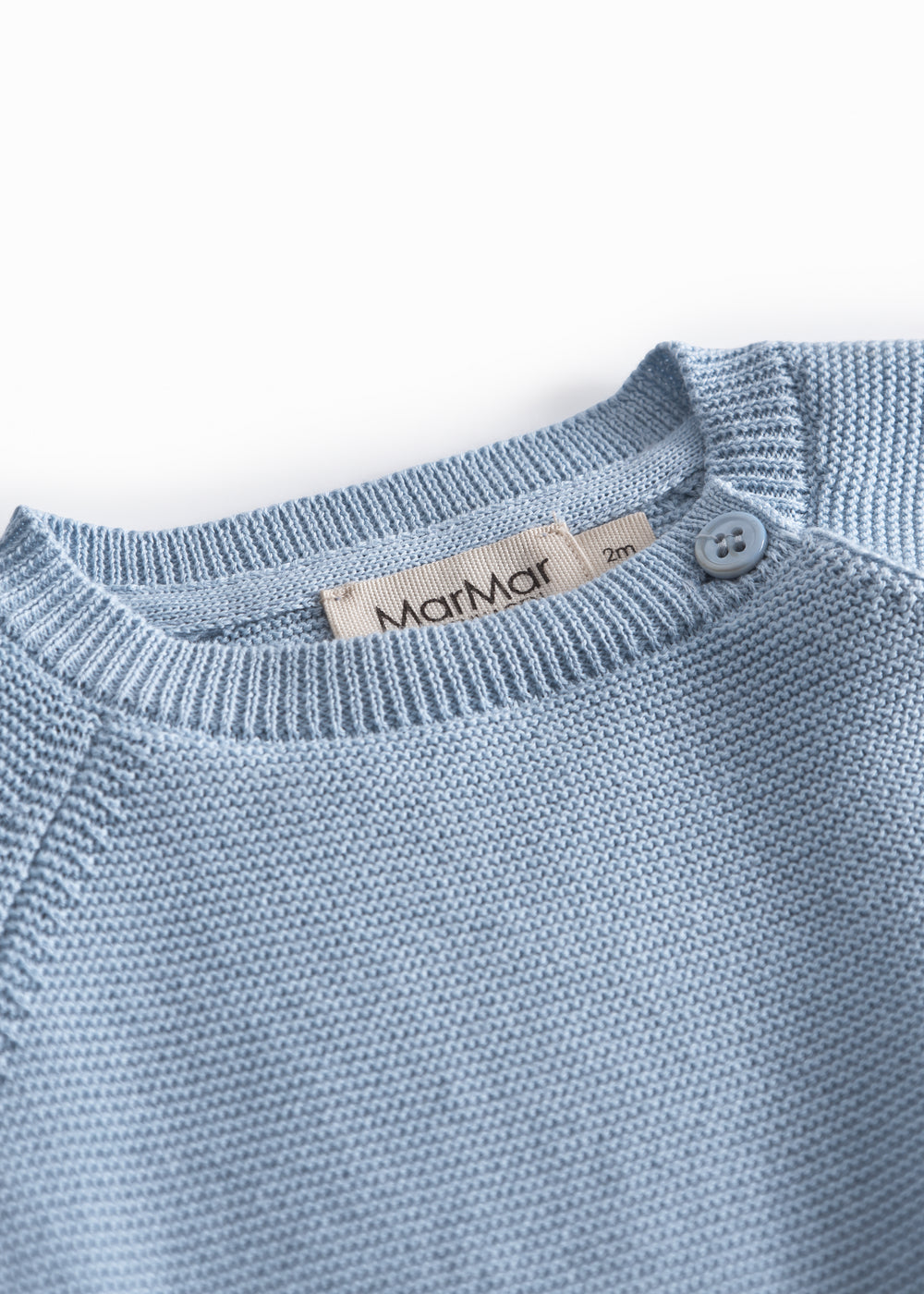 Blå strikket babybluse med knaplukning