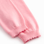 Lyserøde strikbukser til baby