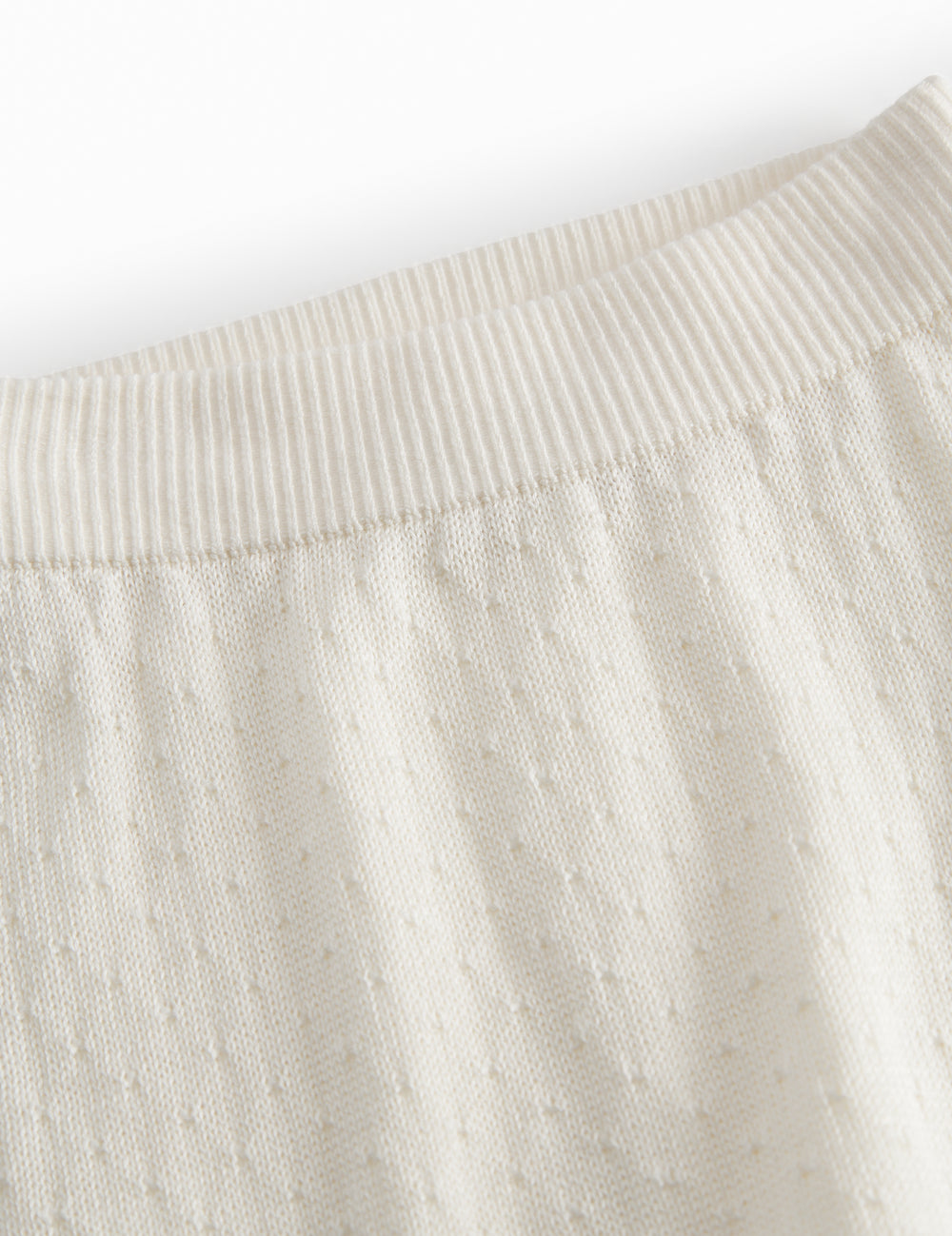 Hvide baby strikbukser med fint hulmønster