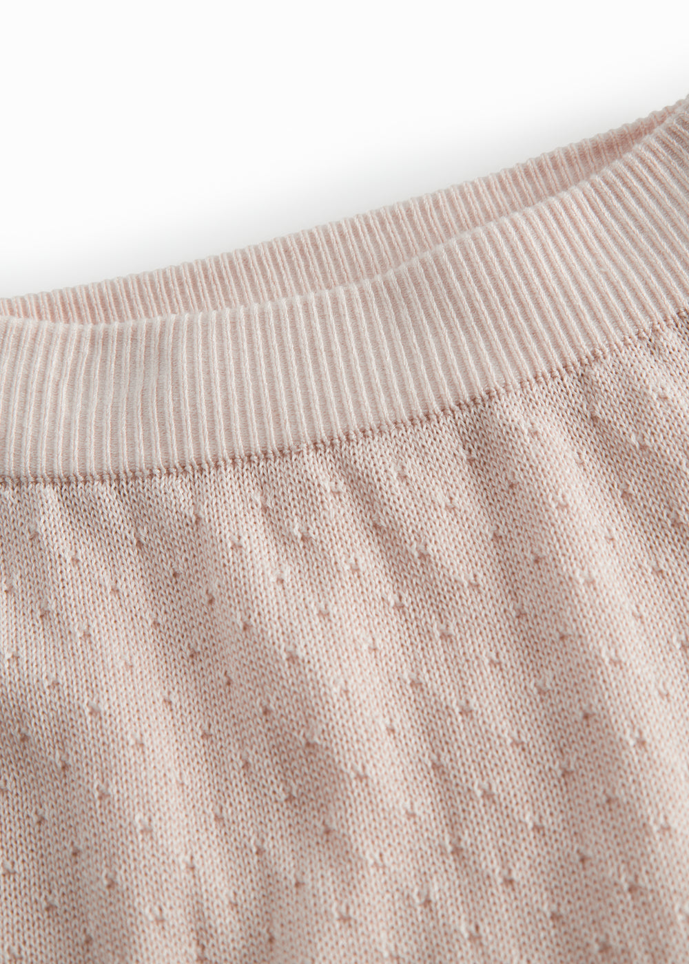 Lyserøde baby strikbukser med fint hulmønster