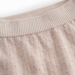 Lyserøde baby strikbukser med fint hulmønster