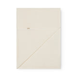 Hvid baby striktæppe med hulmønster