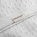 Lysegrøn baby striktæppe med hulmønster