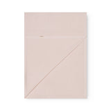 Lyserød baby striktæppe med hulmønster