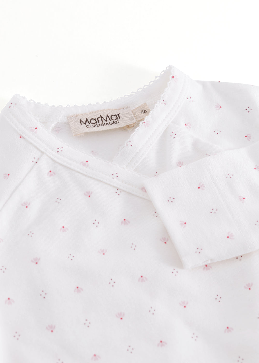 Hvid baby bodystocking med små blomster